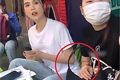 Ngọc Trinh cầm dù "chà neo" check in chợ Hồ Thị Kỷ, chị đẹp đấy nhưng làn da thua cả "ô sin"
